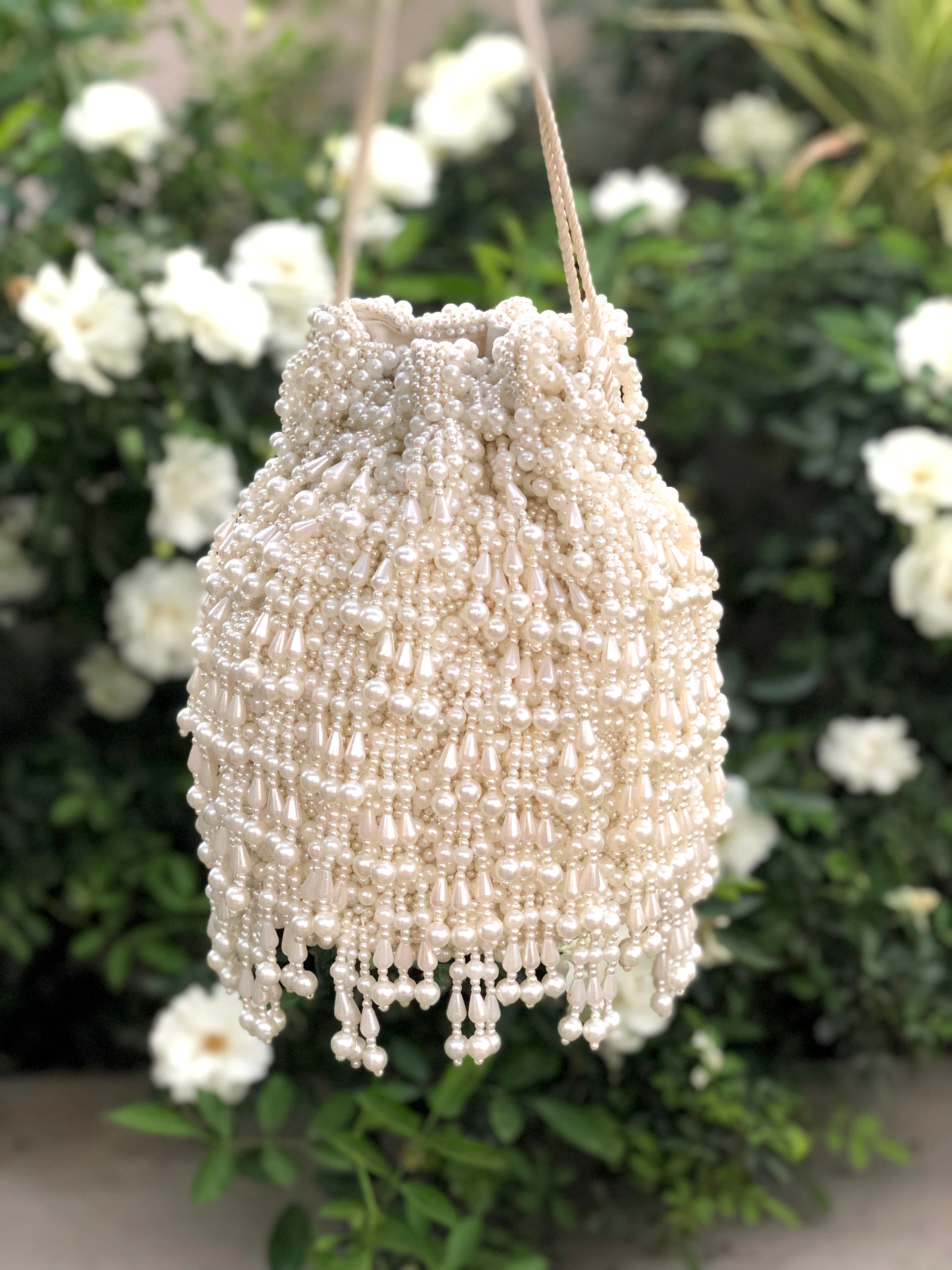 Cream Ainaaz Flapper Bucket Bag