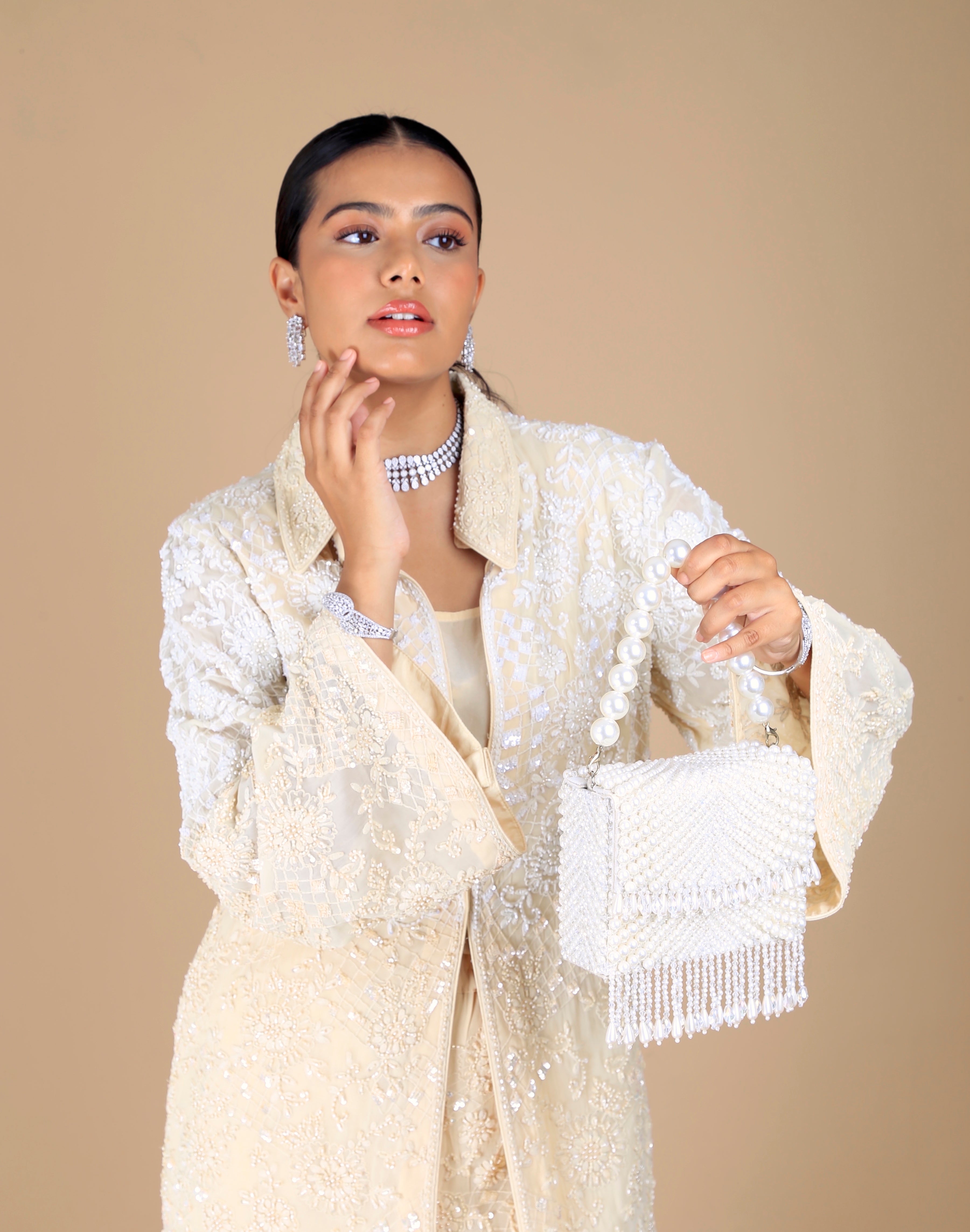 Lumina Pearl Clutch